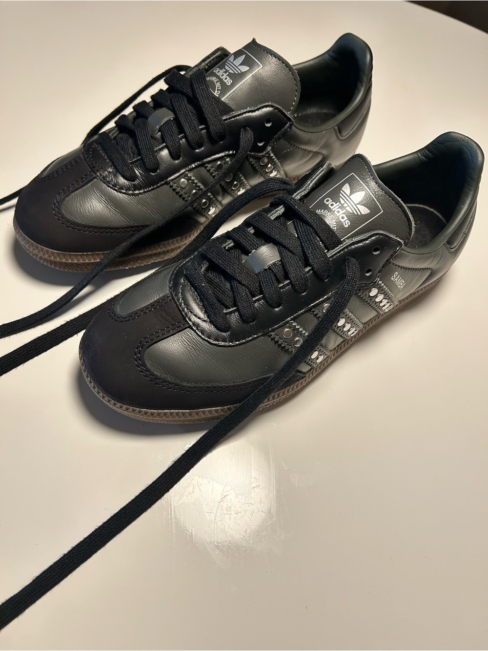 Adidas black Samba’s with studded 3 stripes